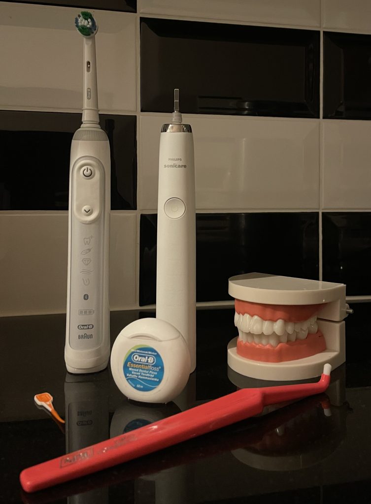 Electric toothbrush in bathroom